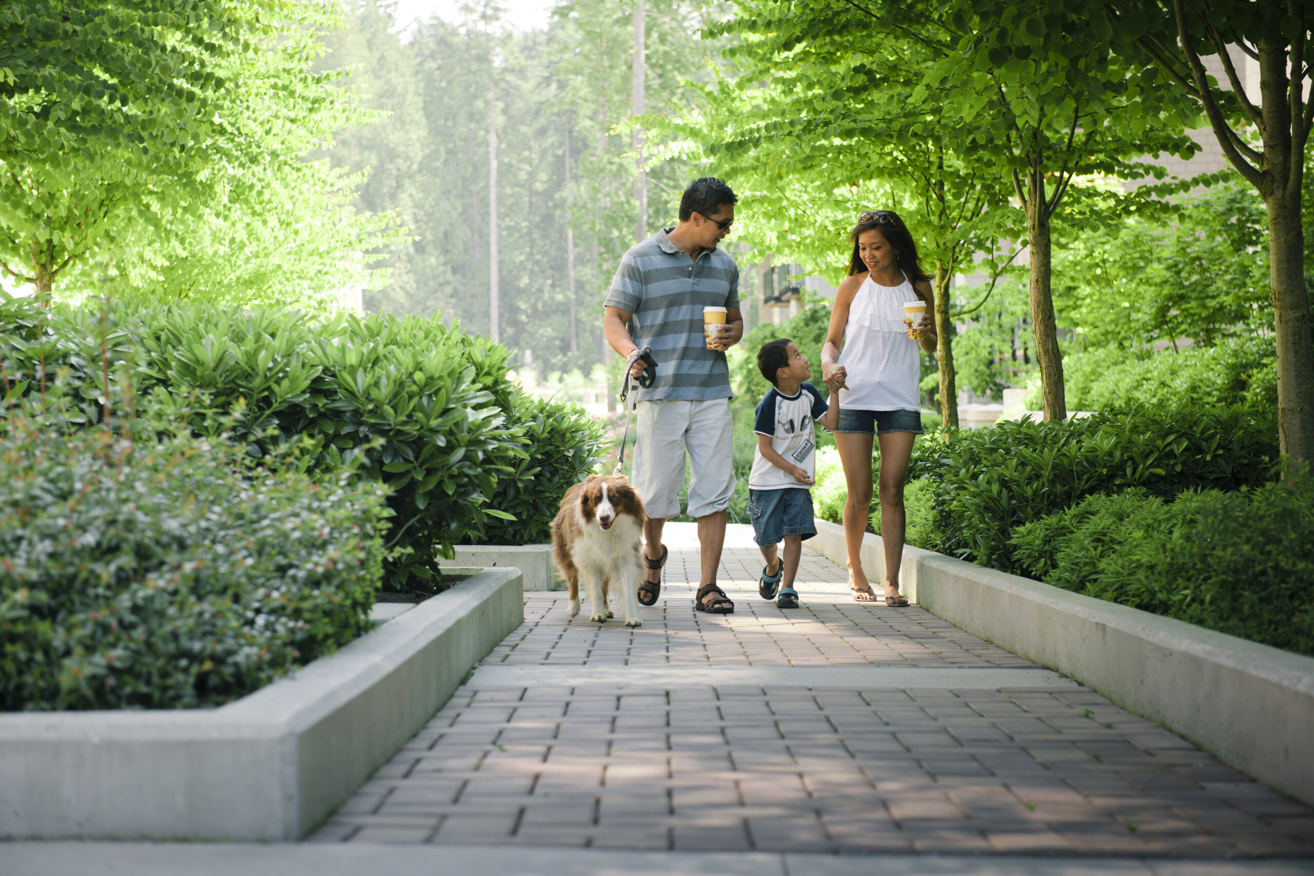 Family of 3 and a dog in Wesbrook Village