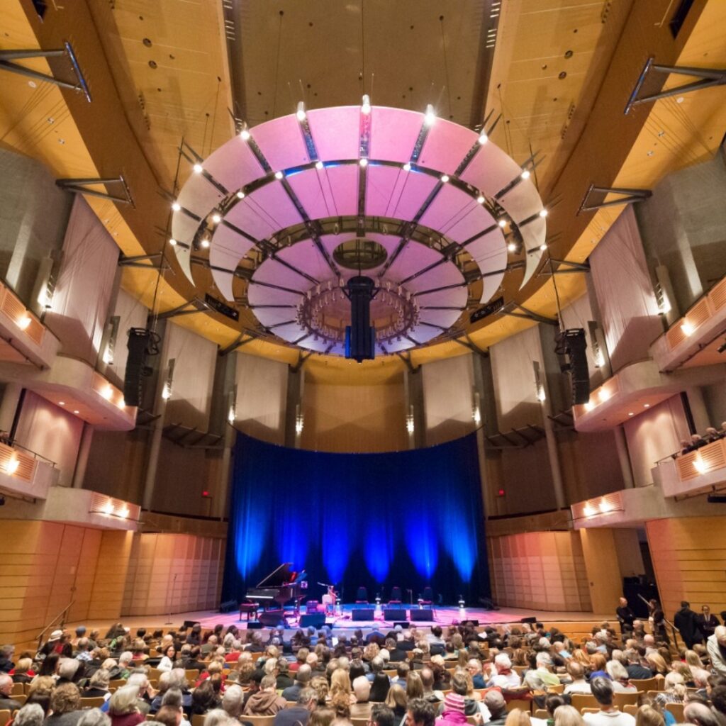 Auditorium filled with people at the Chan Centre for the Performing Arts.