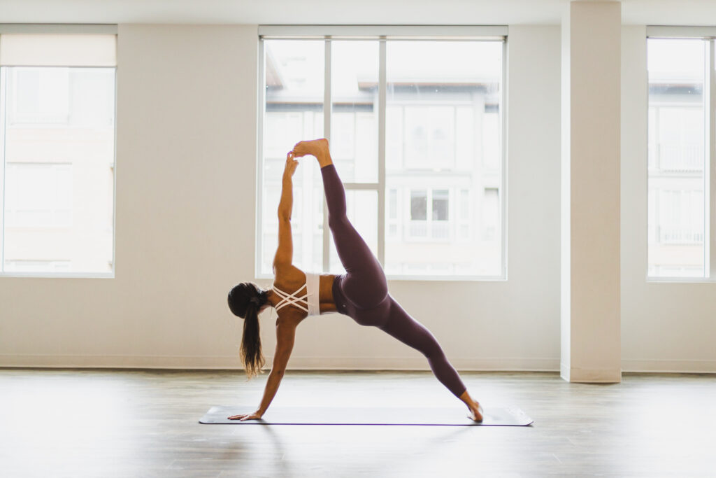 Woman doing yoga at VNYSA Yoga Studio.
